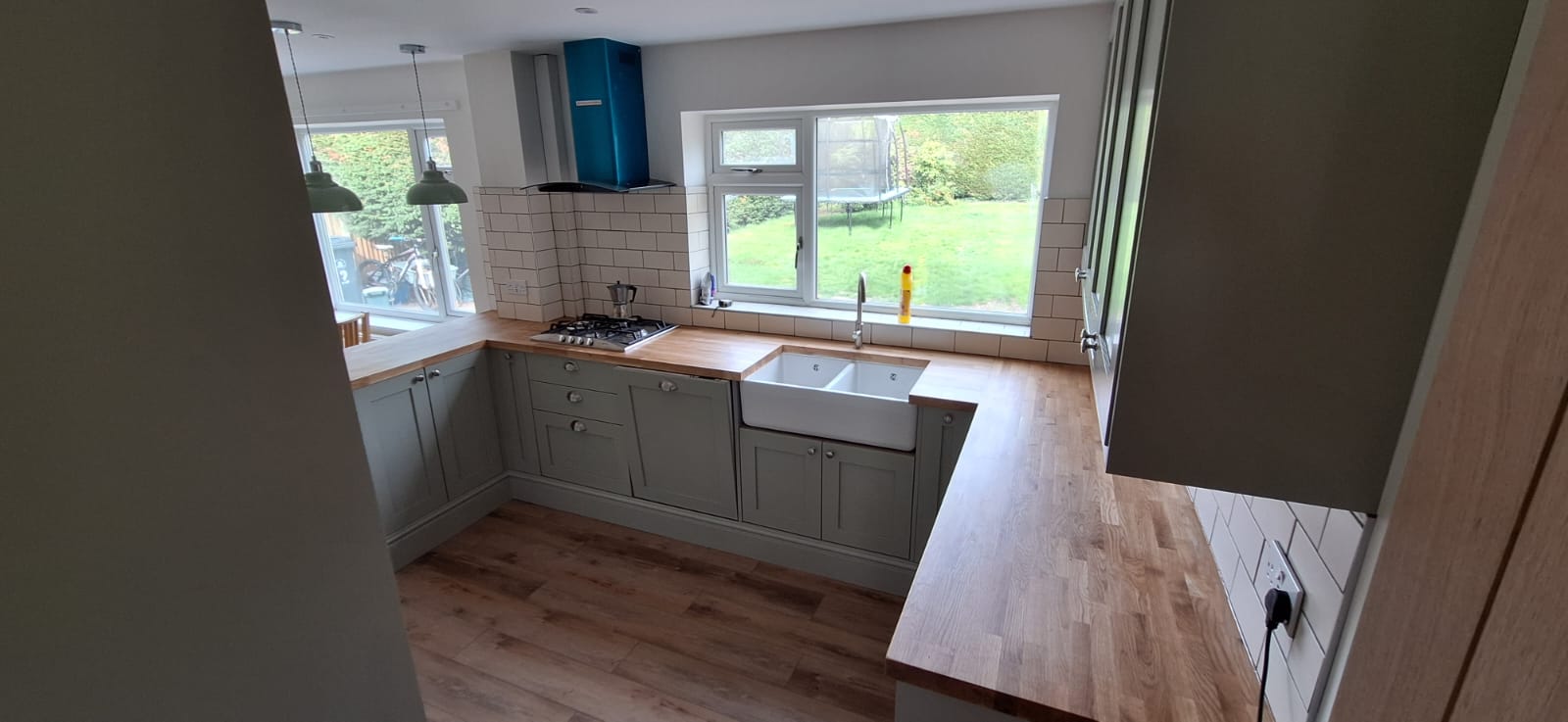 Oak worktops, Belfast sink and fitted shaker cabinets